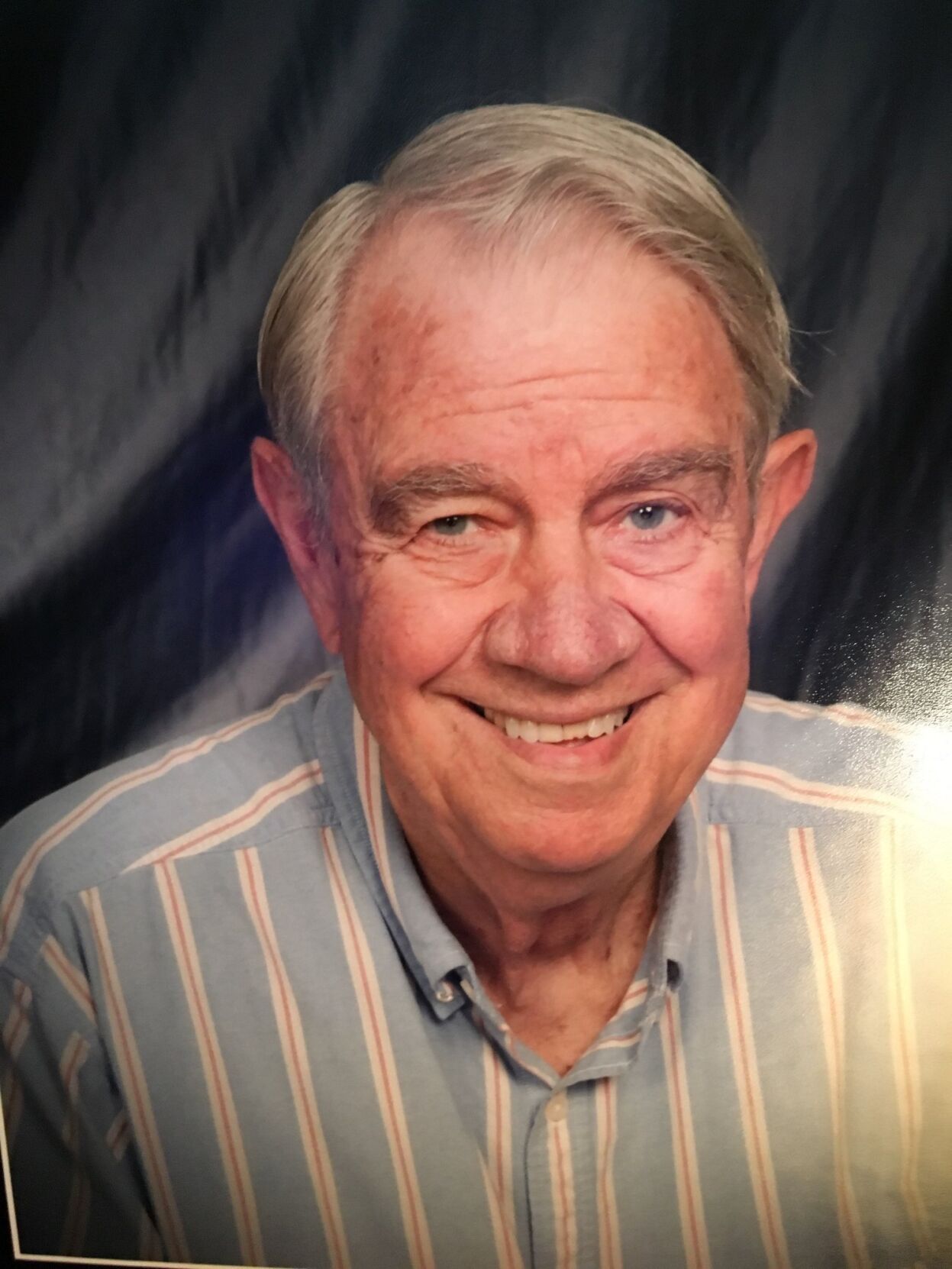 The Rev. Dr. E. Gene Rooney